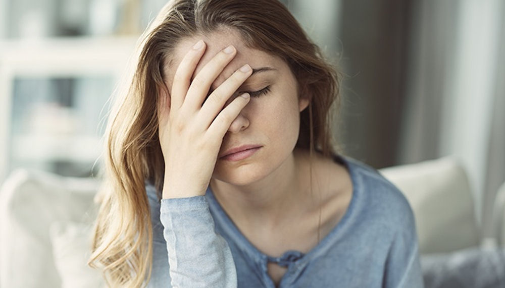 A woman showing signs of high-functioning depression