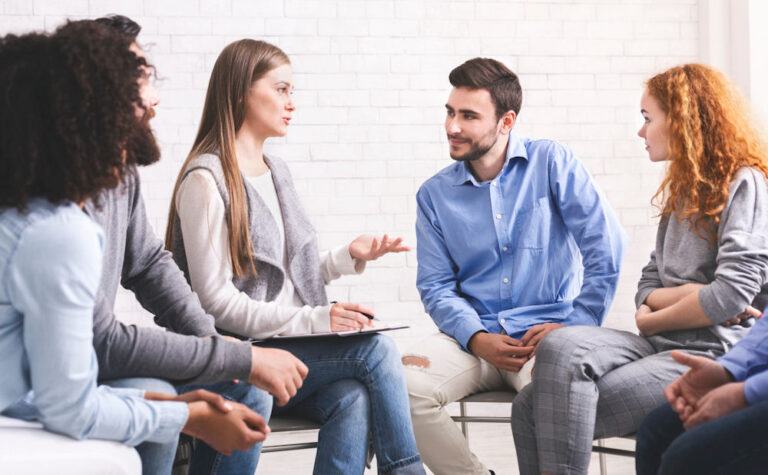 Support Group Listening During Rehab Session