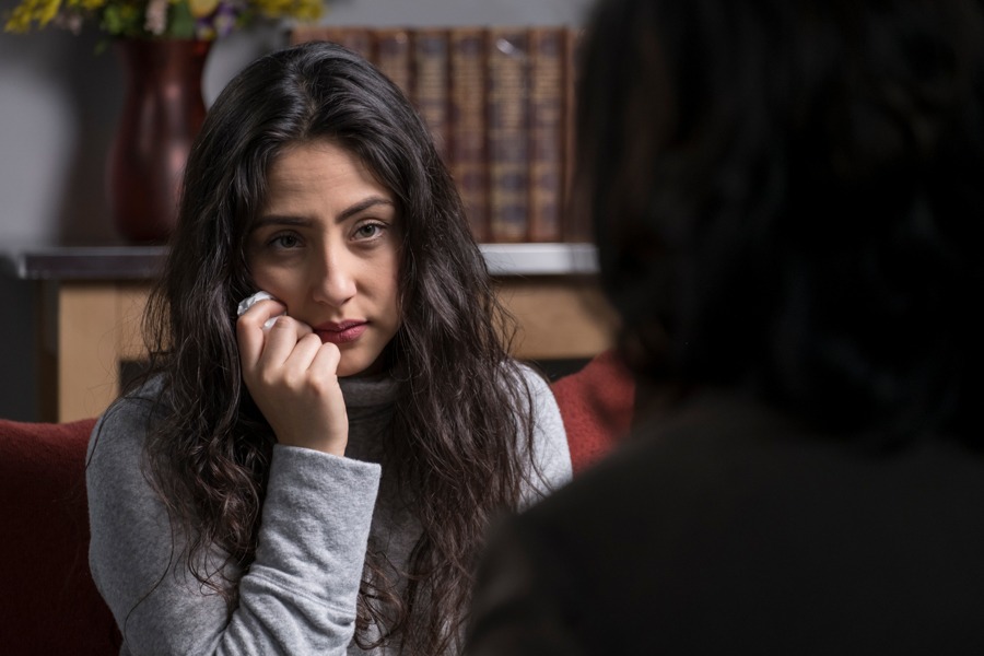 Woman Listening to Therapist in Stimulant Treatment