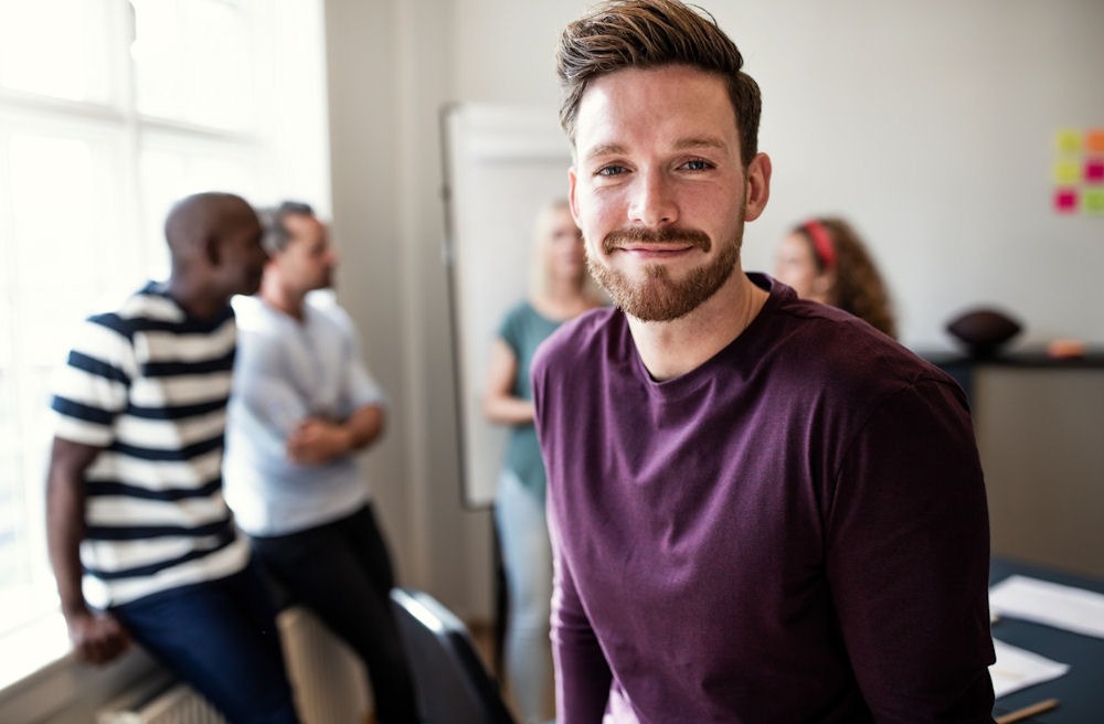 texas-residential-treatment Confident young man in recovery group setting during residential treatment program